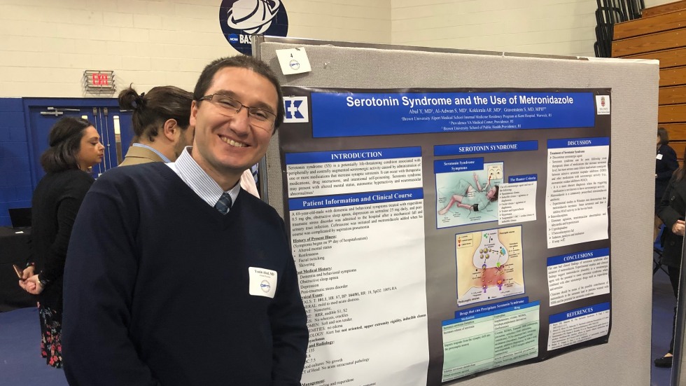 man with poster presentation
