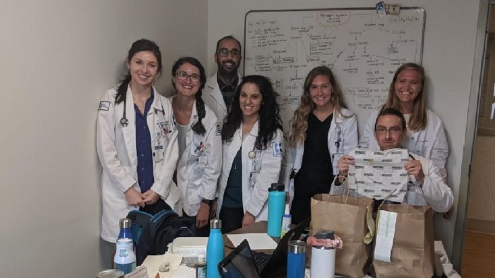 doctors posing in room after lunch