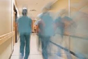 medical staff walking in hallway